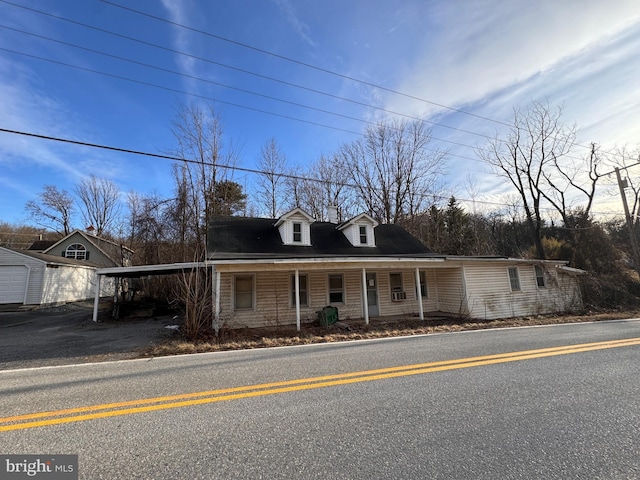 view of front of property with an attached carport