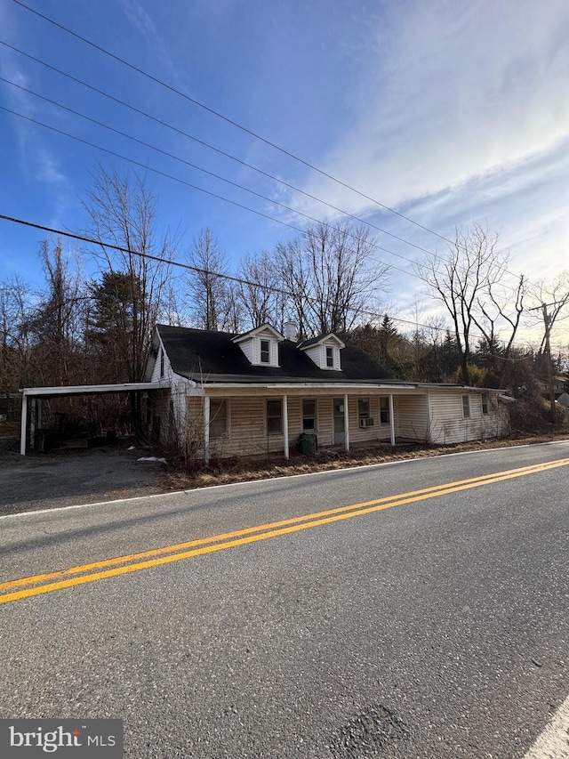 view of front of property featuring a chimney