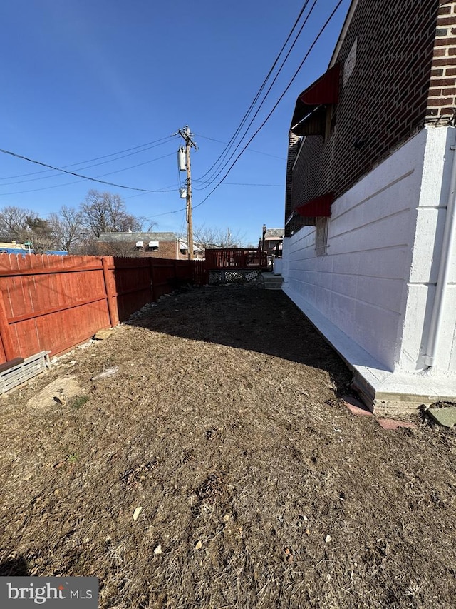 view of yard featuring fence