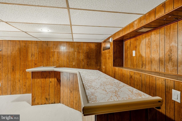 interior space with a sauna and wood walls