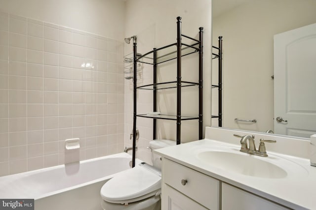 full bath with toilet, bathing tub / shower combination, and vanity