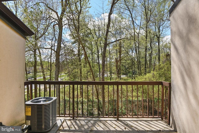 wooden deck with central AC unit
