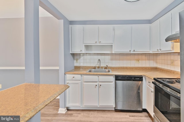 kitchen featuring light wood finished floors, range with electric stovetop, under cabinet range hood, dishwasher, and a sink