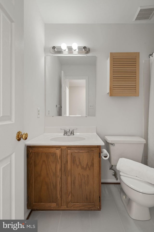 full bathroom featuring vanity, tile patterned floors, toilet, and visible vents