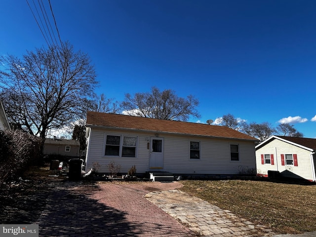 view of front of home with a front yard