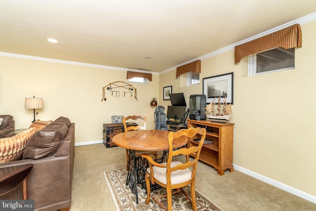 carpeted dining area featuring recessed lighting, crown molding, and baseboards