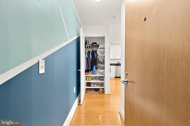 corridor featuring light wood-type flooring