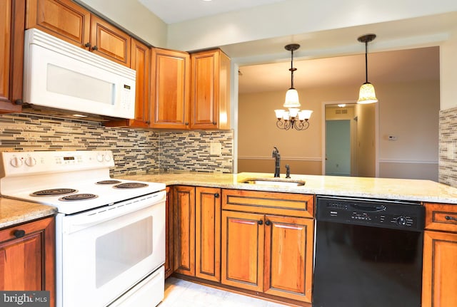 kitchen with a sink, decorative backsplash, white appliances, and brown cabinets