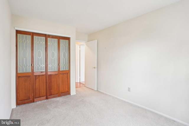 unfurnished bedroom featuring carpet flooring