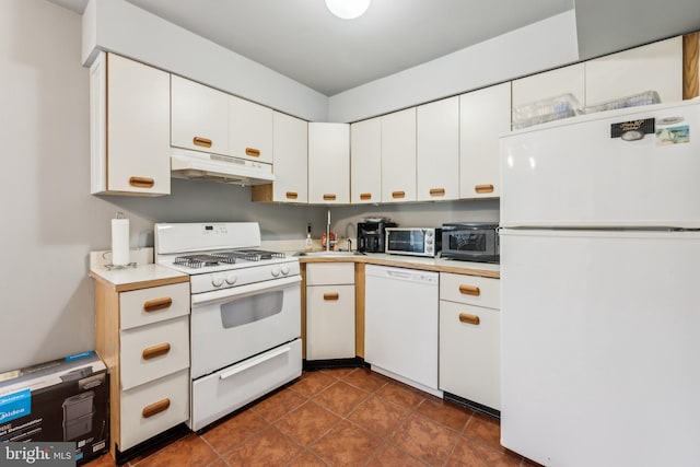 kitchen featuring white appliances, under cabinet range hood, white cabinetry, and light countertops