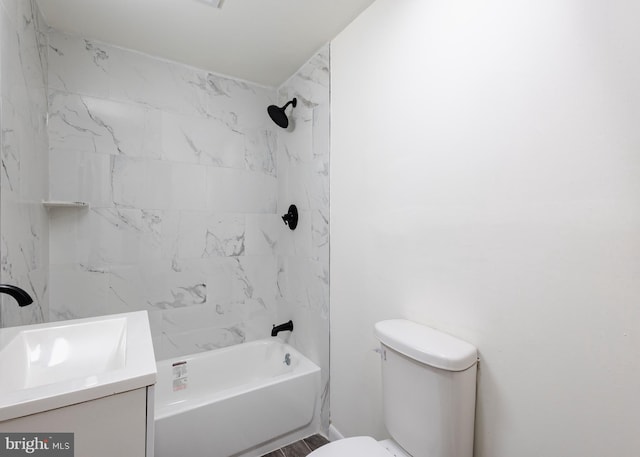 bathroom featuring  shower combination, toilet, and vanity