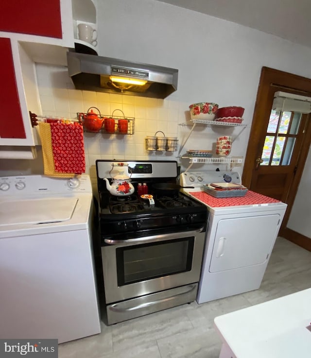 kitchen with tasteful backsplash, gas stove, washer / clothes dryer, and light countertops