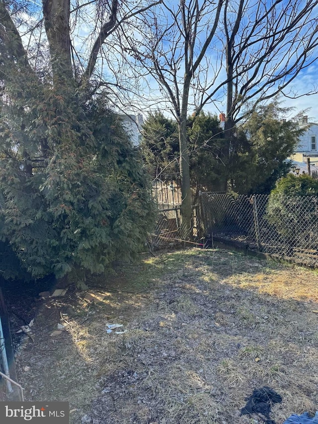 view of yard with fence