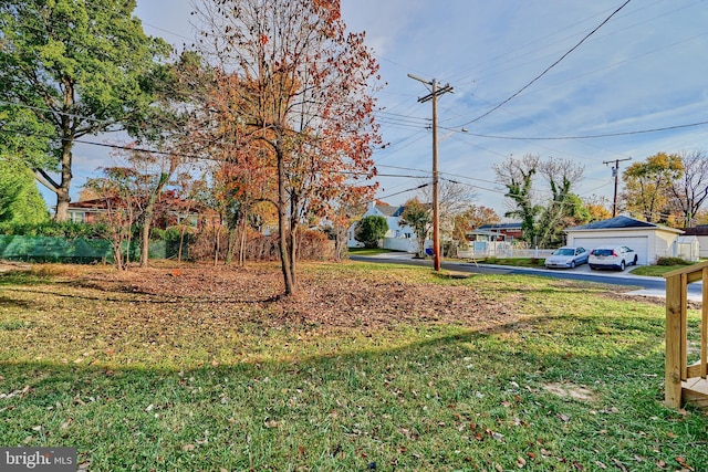 view of yard featuring a garage