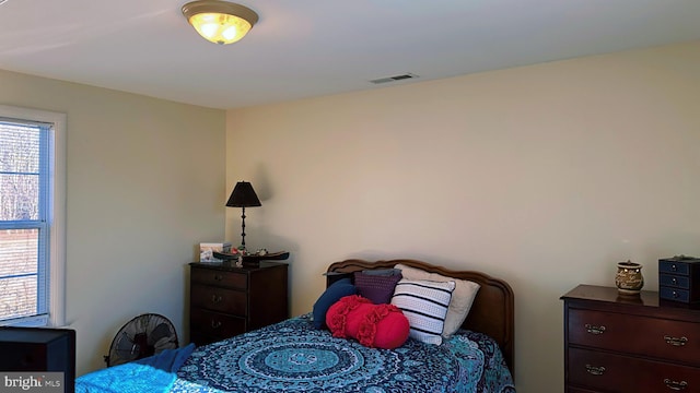 bedroom with visible vents