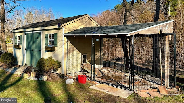 view of outdoor structure featuring an outbuilding and an exterior structure