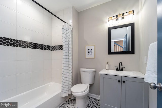 full bath with shower / bath combo, baseboards, toilet, tile patterned floors, and vanity