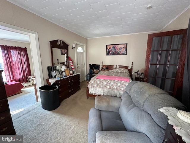 carpeted bedroom with baseboard heating and ornamental molding