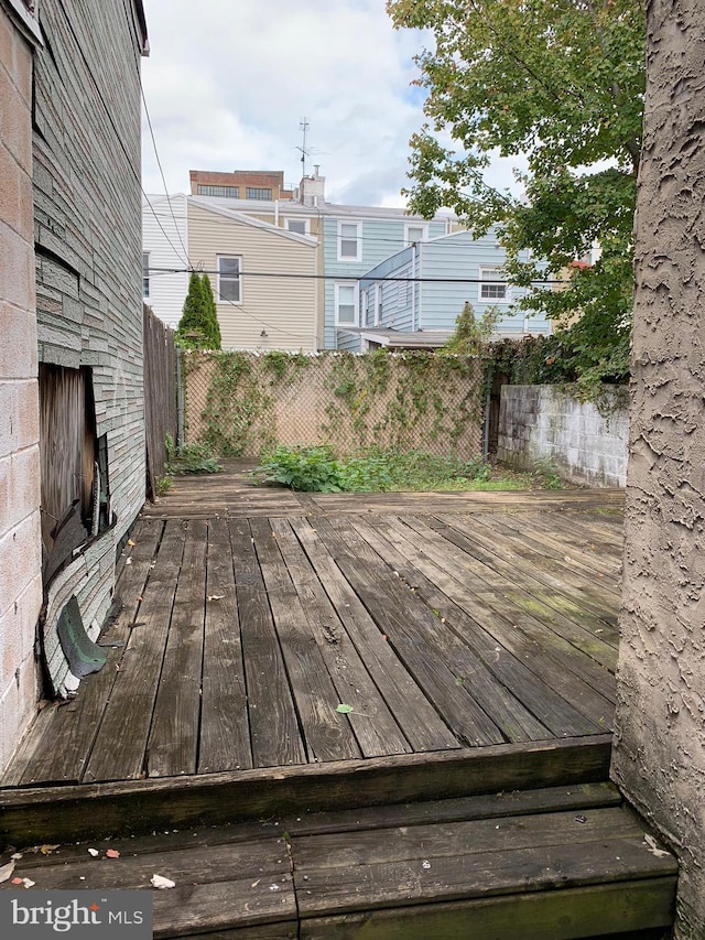 wooden terrace with fence