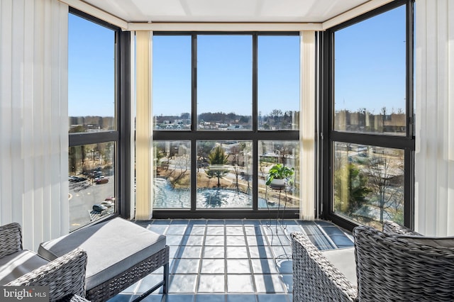 sunroom featuring plenty of natural light