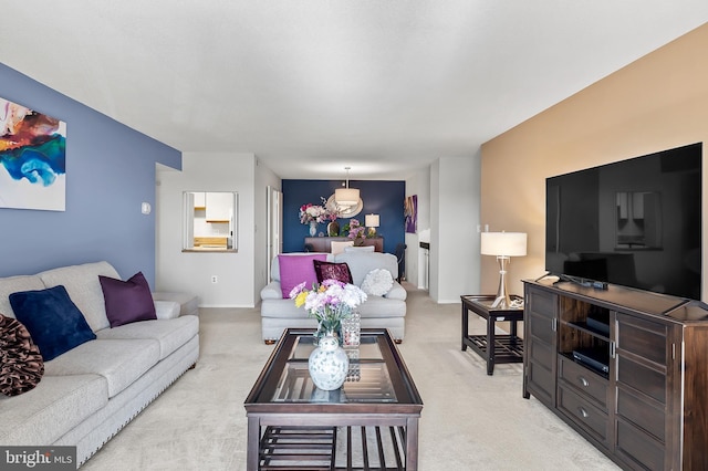 living area featuring light colored carpet