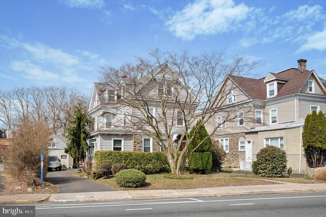 view of front of house with a residential view