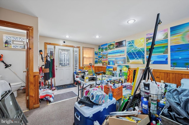 interior space featuring tile patterned flooring, recessed lighting, and carpet floors