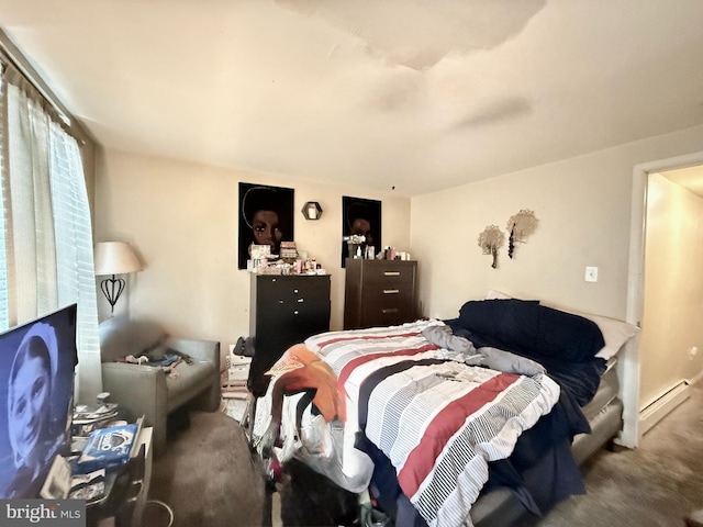 carpeted bedroom with a baseboard radiator