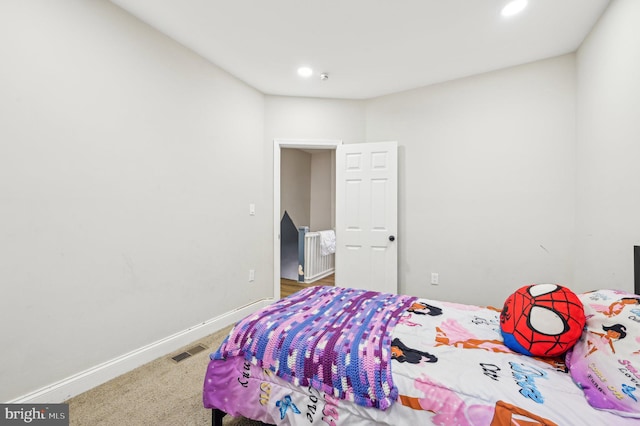 bedroom featuring recessed lighting, carpet flooring, baseboards, and visible vents