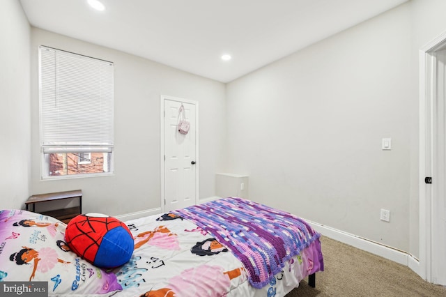 carpeted bedroom with recessed lighting and baseboards