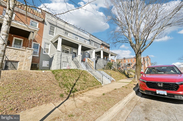 multi unit property featuring brick siding