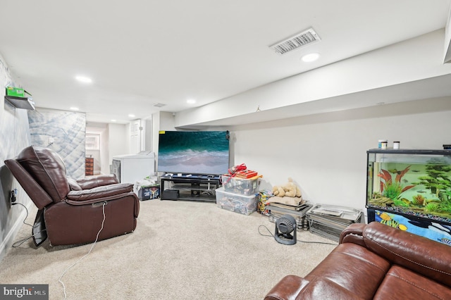 living area with carpet flooring, recessed lighting, and visible vents