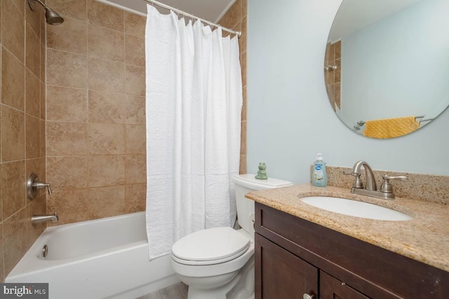 full bath featuring toilet, shower / bath combination with curtain, and vanity