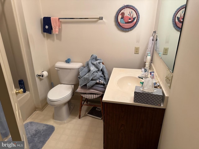 bathroom with toilet, shower / bath combination, vanity, and tile patterned floors