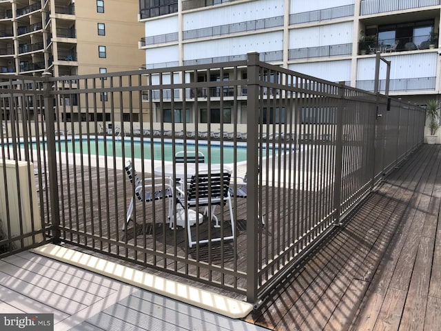 community pool with fence