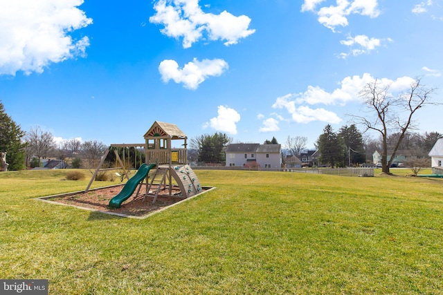 view of play area with a yard