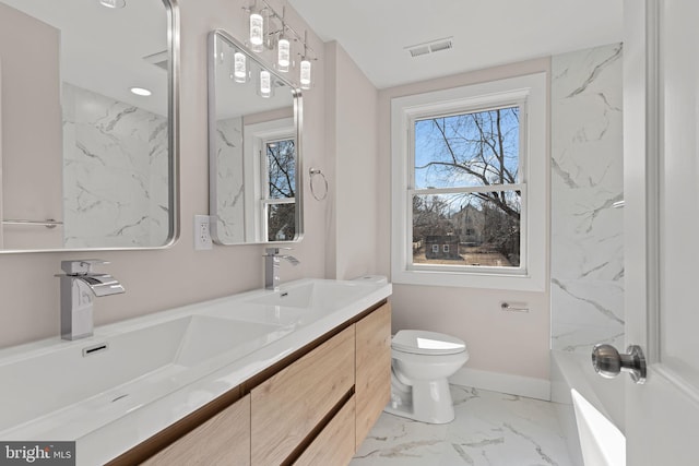 bathroom featuring toilet, a sink, visible vents, marble finish floor, and double vanity