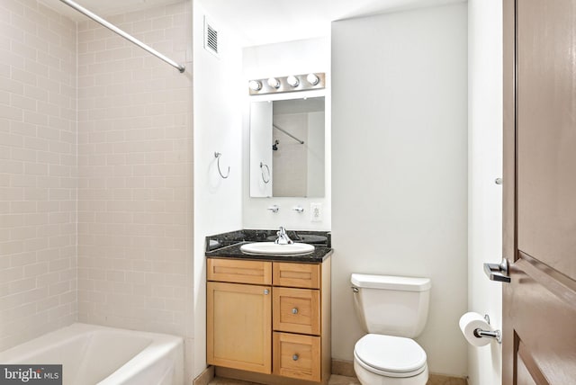 bathroom with visible vents, tub / shower combination, vanity, and toilet