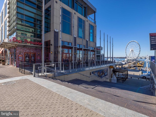 view of building exterior with a water view