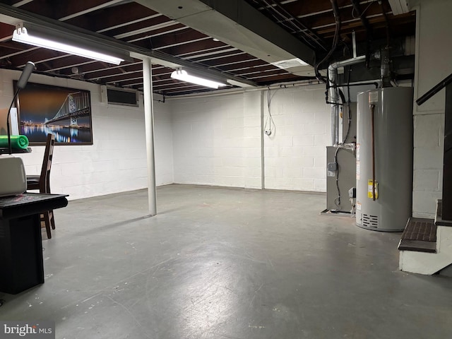 unfinished basement with gas water heater