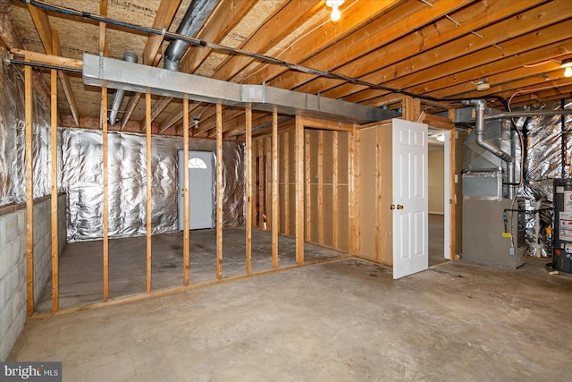 unfinished basement with heating unit