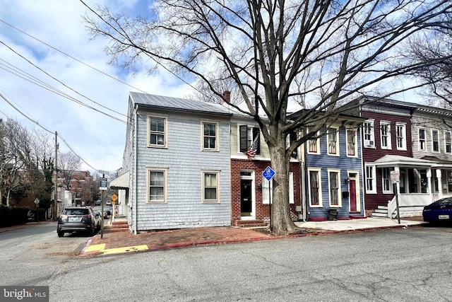 multi unit property with entry steps and a chimney