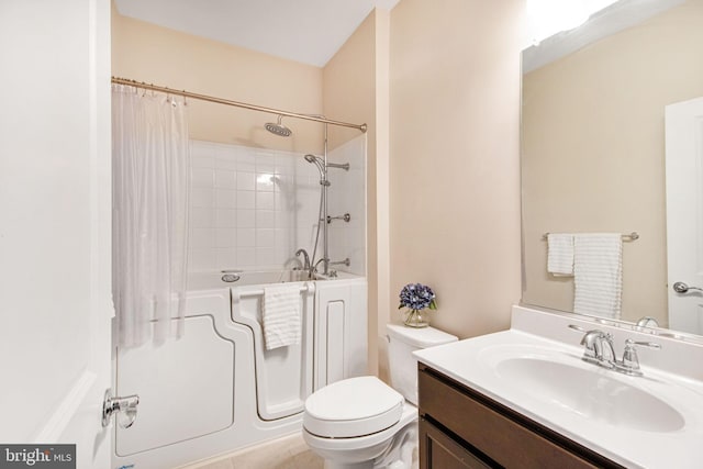 bathroom with toilet, shower / bath combo with shower curtain, and vanity