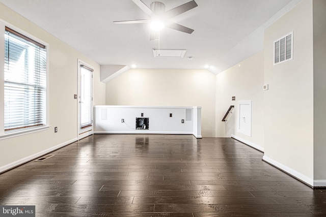 interior space with plenty of natural light, wood-type flooring, and visible vents