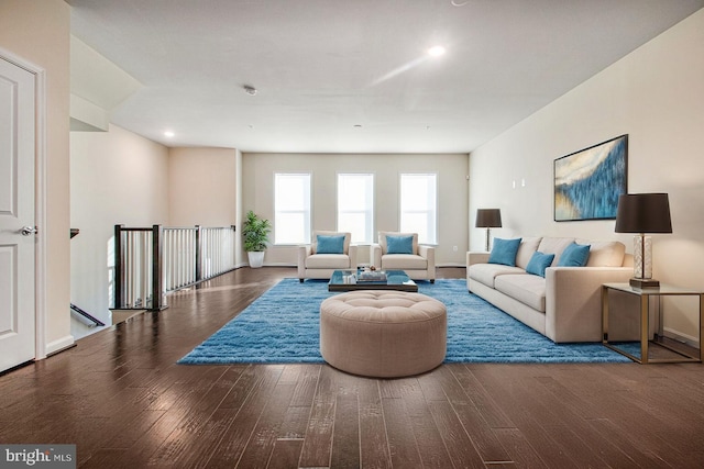 living room with wood finished floors and baseboards