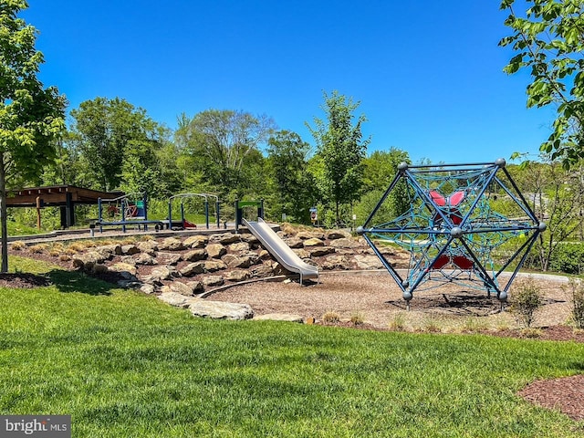 view of jungle gym with a lawn