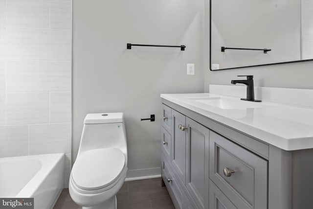 full bath with tile patterned flooring, vanity, toilet, and baseboards