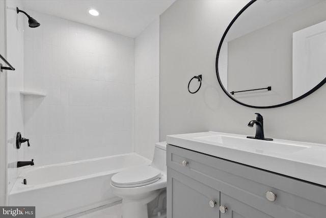 full bath with tub / shower combination, vanity, toilet, and recessed lighting