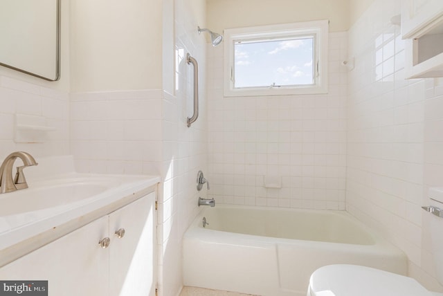 bathroom with shower / bath combination, toilet, and vanity