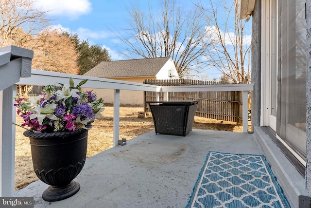 view of patio with fence